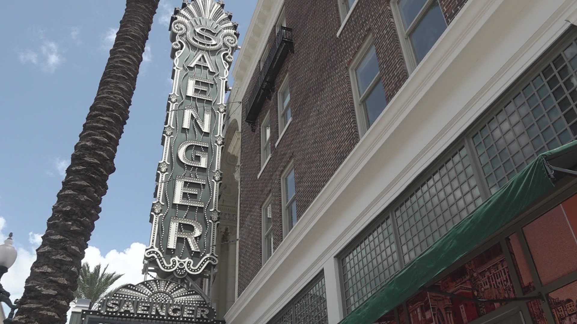 More than 20 months after the Hard Rock site collapsed, the street in front of the Saenger is still closed even though the theatre will soon open.
