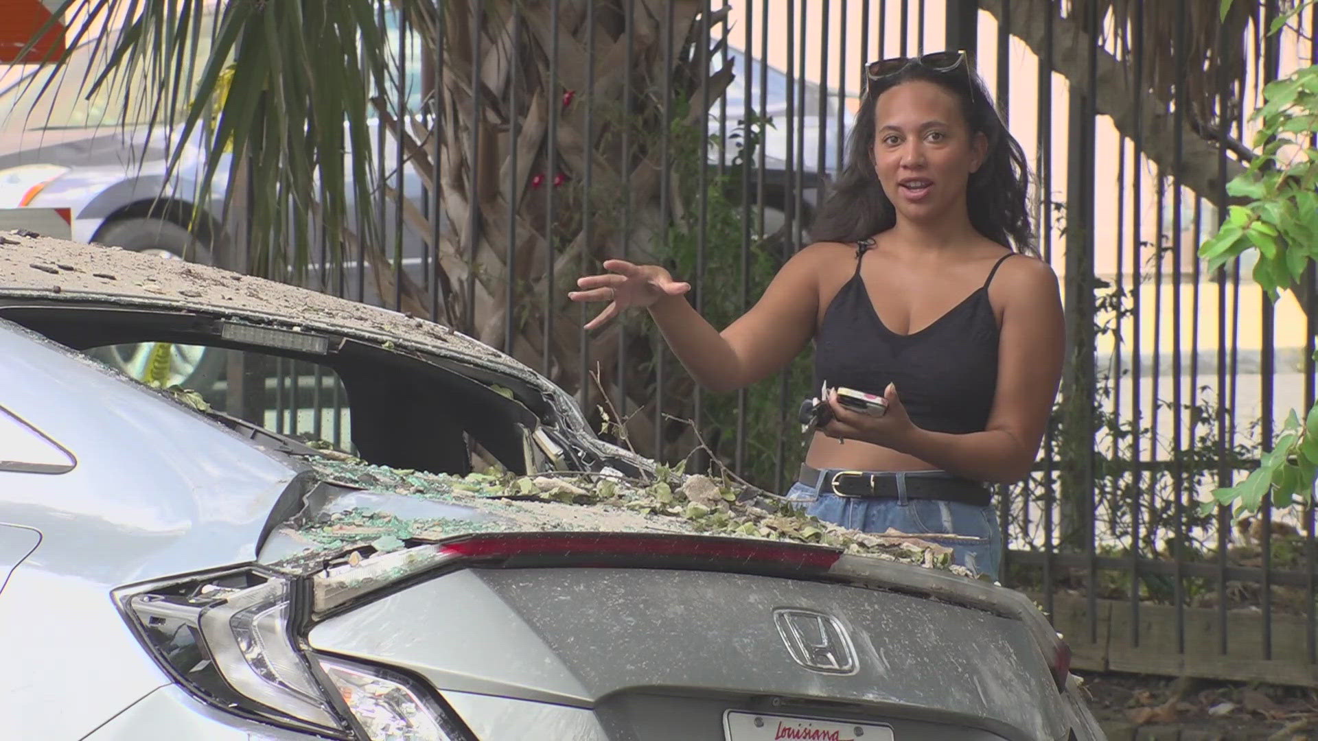 New Orleans-based content creator Alex Robinson posted this video to social media on Saturday after a Central City building collapsed – sending debris through car.