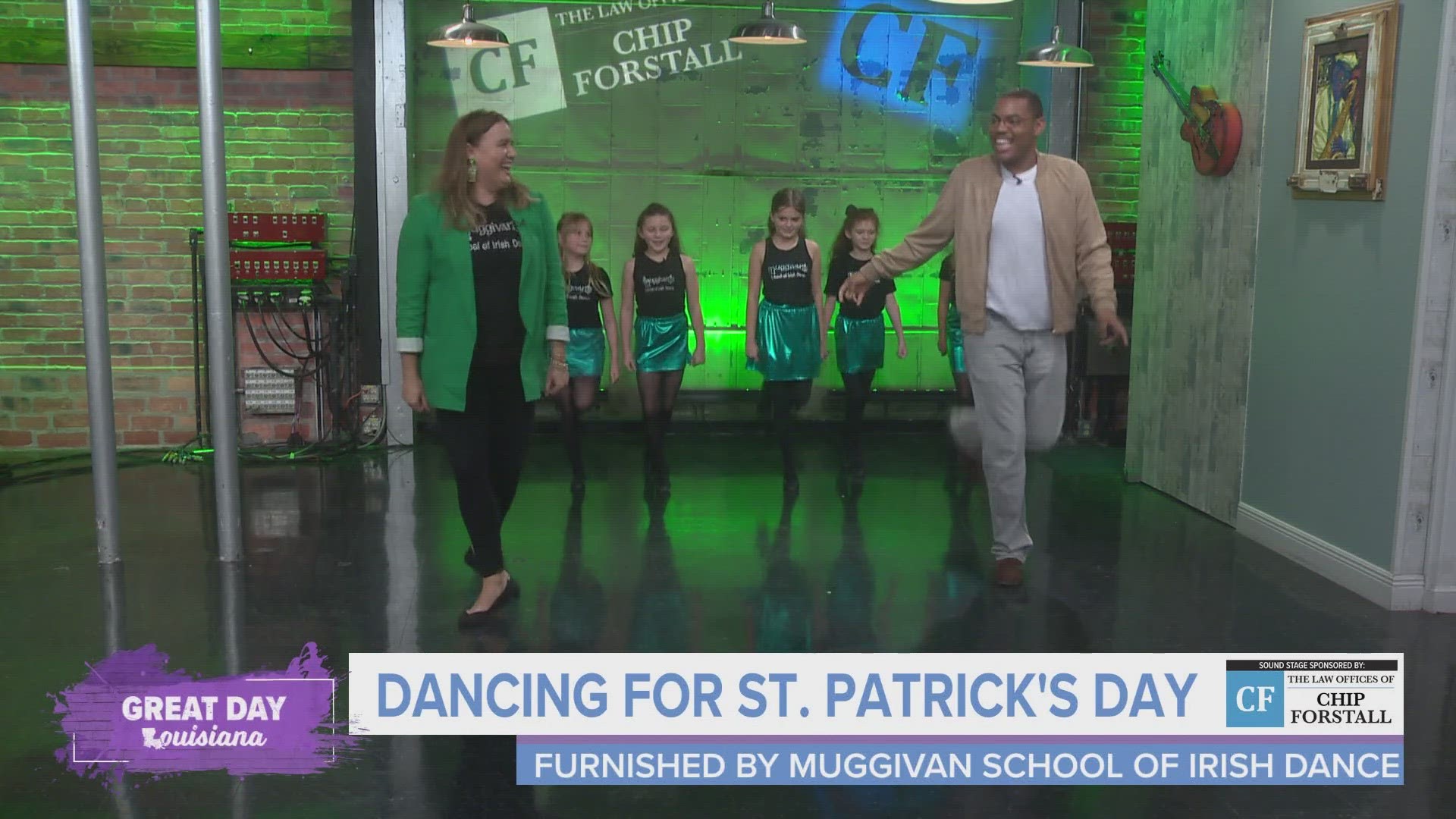 Dancers from the Muggivan School of Irish Dance teach Malik a few moves and perform for us.