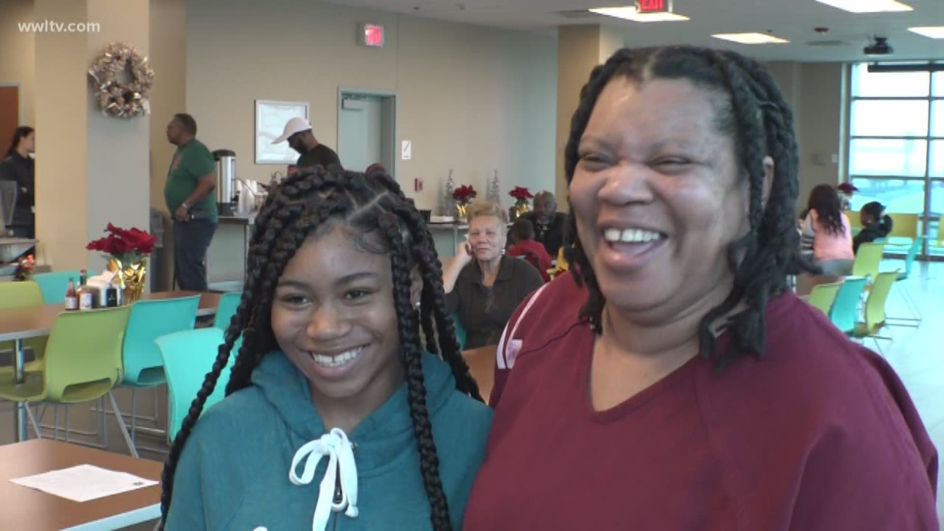 Inside the OPSO cafeteria, complete with a Christmas tree, presents donated from local church groups and a visit from Santa, incarcerated mothers had the chance to hug, laugh and learn with their children.