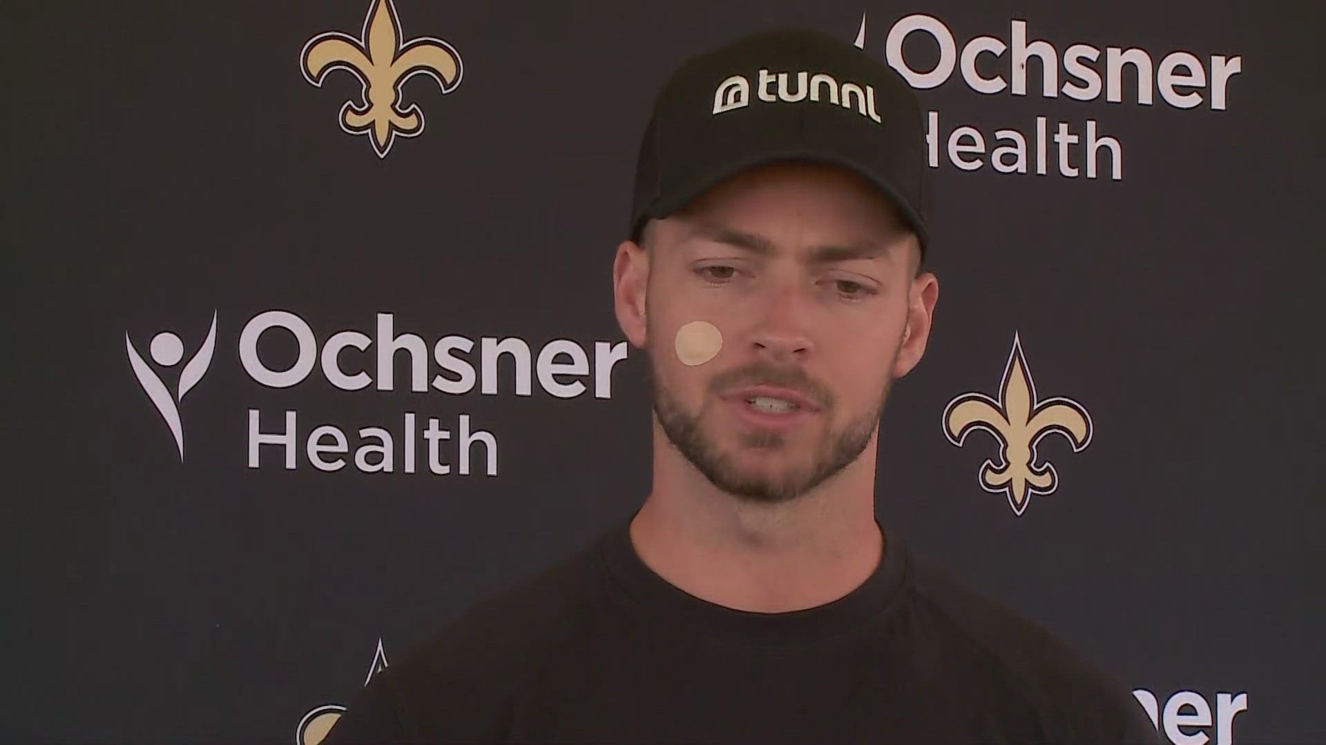 Saints second-year quarterback Jake Haener told media the wound on his right cheek was recenlty diagnoses as a rare form of skin cancer in young people.