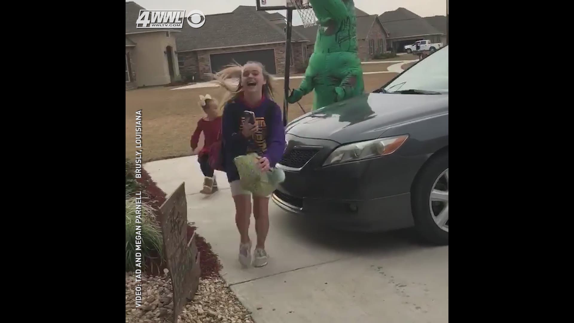 Louisiana dad in T-Rex costume waiting for daughter's bus goes viral