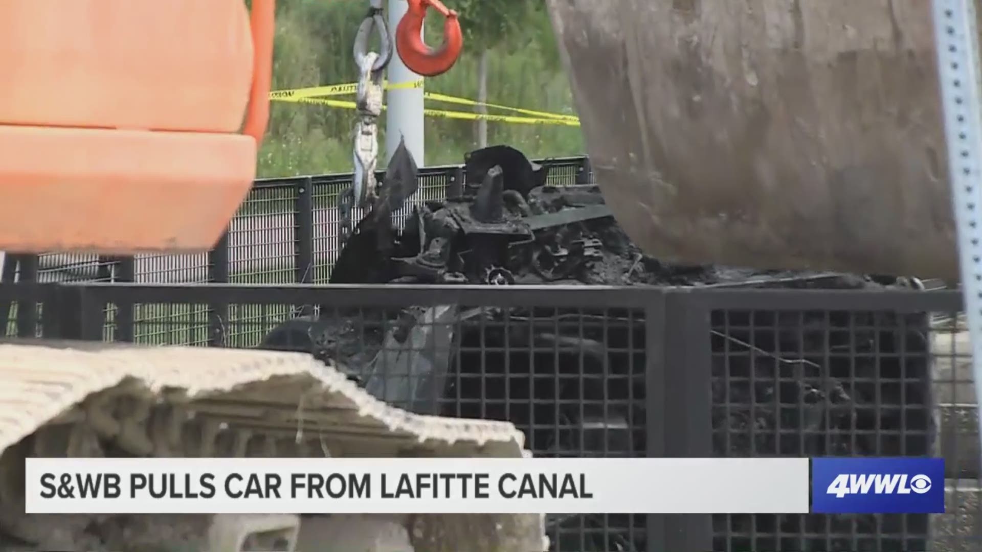 A Mazda 626 was pulled from an underground canal in New Orleans Thursday after several hours of work. The car was discovered along with other debris after an amphibious vehicle inspected the canal following overtopping of the canal during a July 10 rain event.