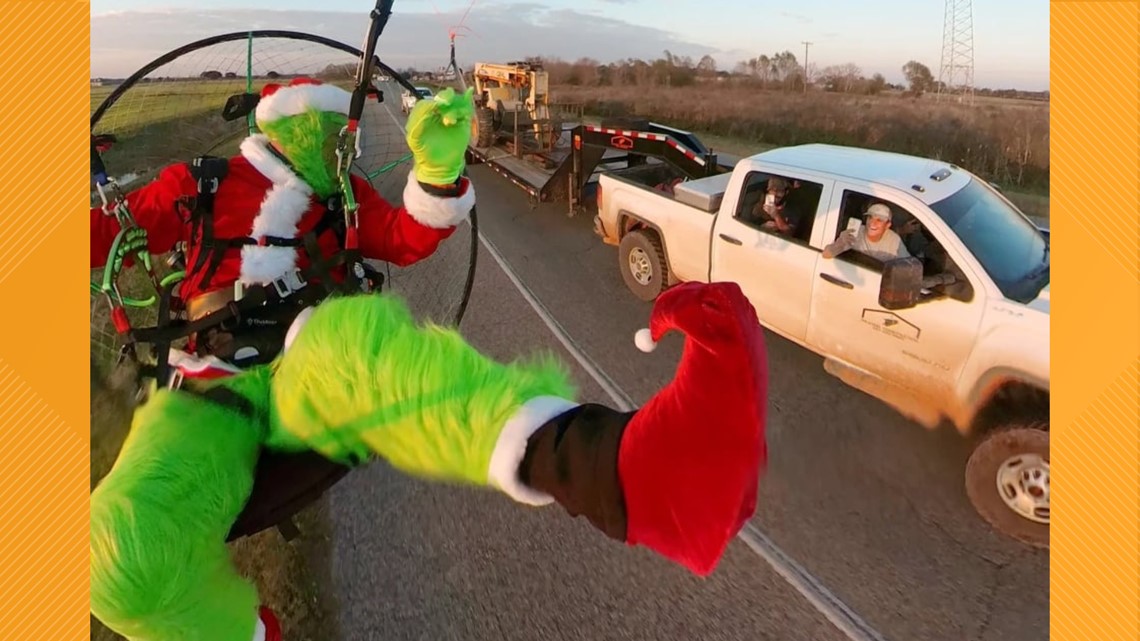 Grinch truck delivers holiday cheer and hope to the QCA