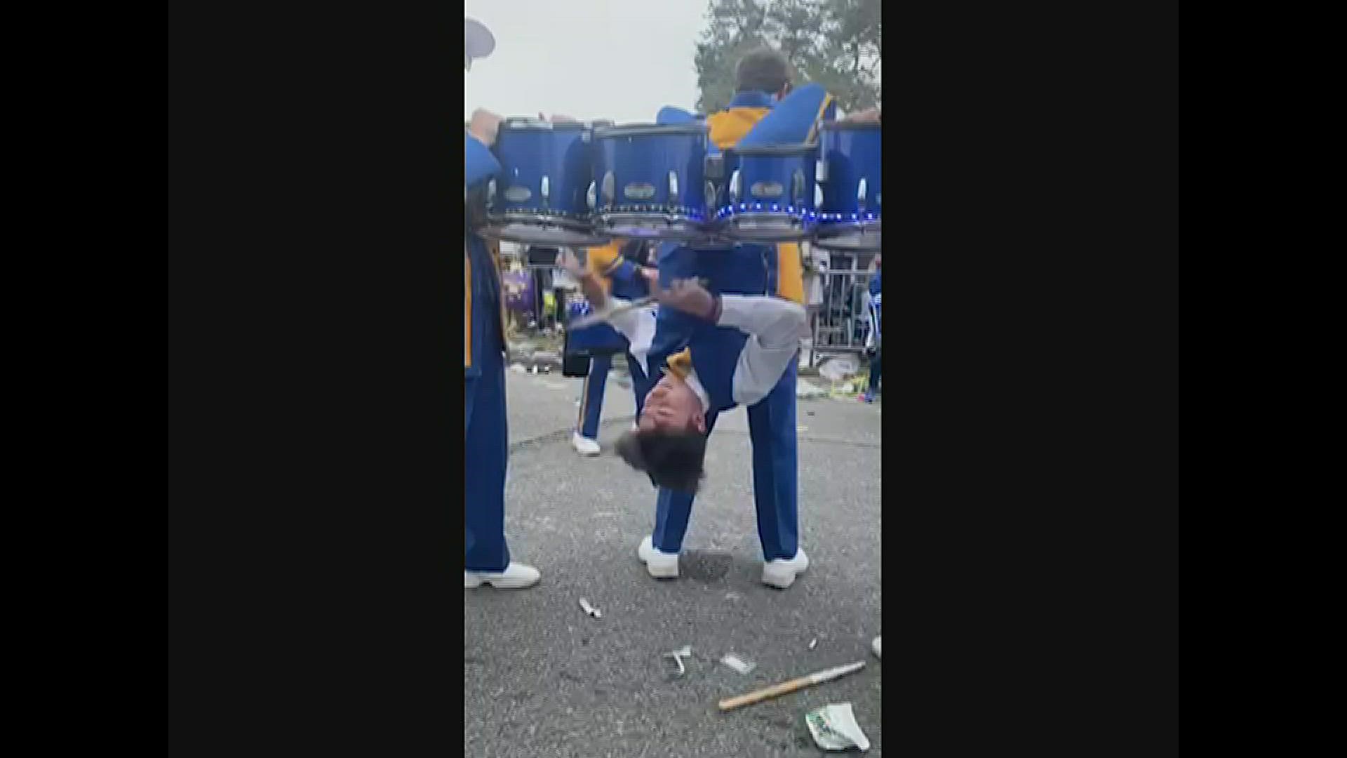 St. Paul's marching band drummer Zach Montz did a number while upside down without missing a beat - amazing!