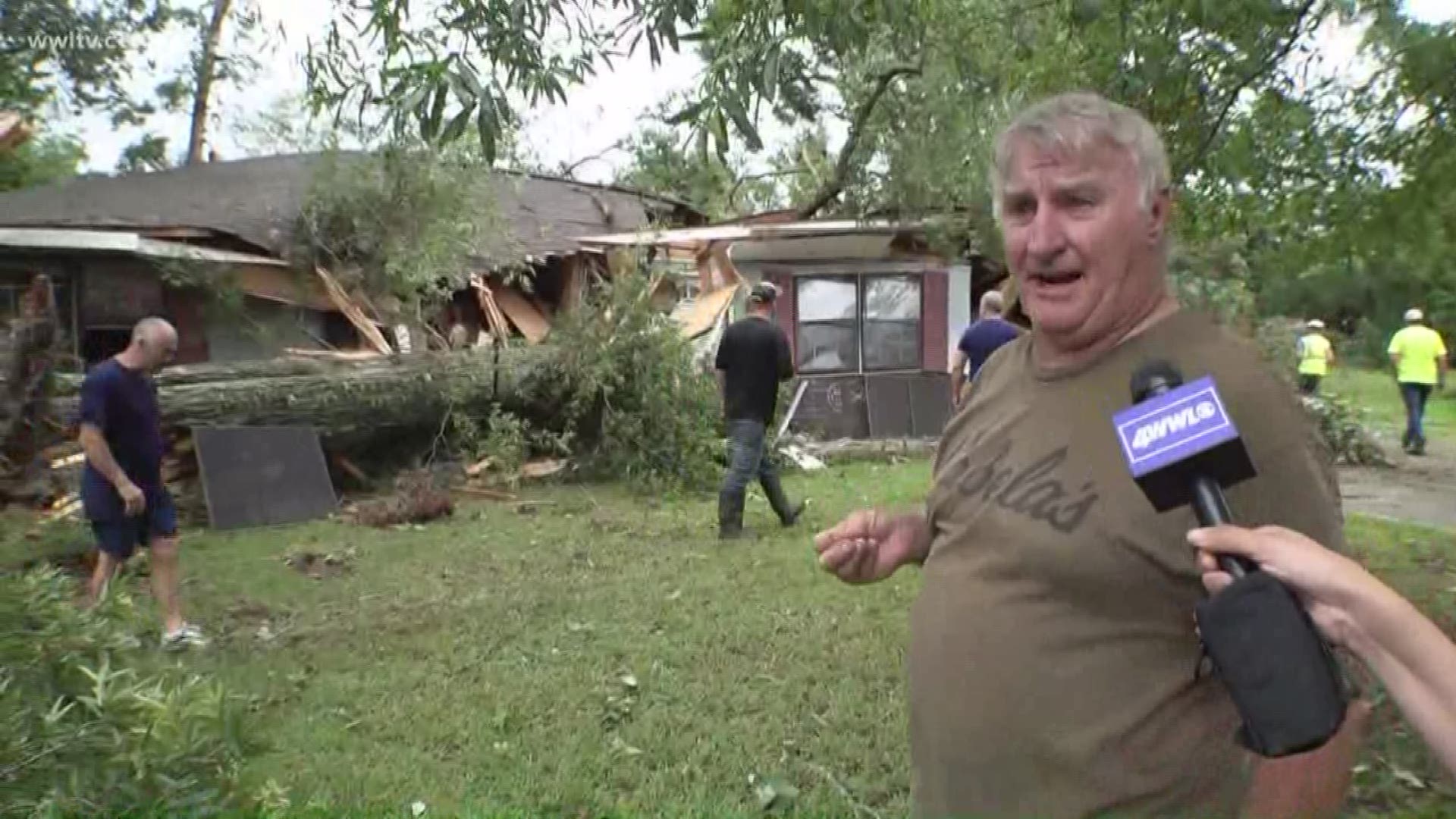 A possible tornado touched down in Galvez, sending trees flying and destroying homes.