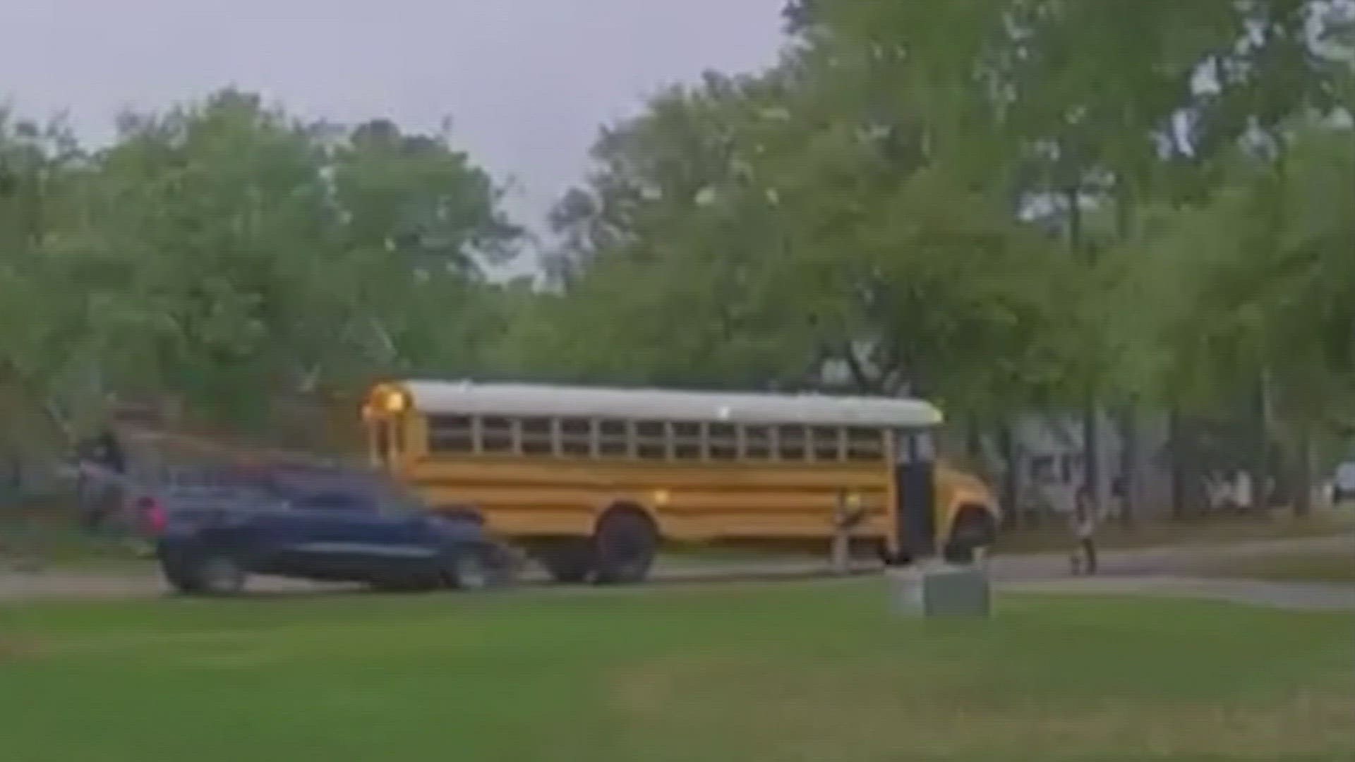 A school bus that was stopping to pick up a Mandeville girl on Tuesday was rammed by a pickup truck.
