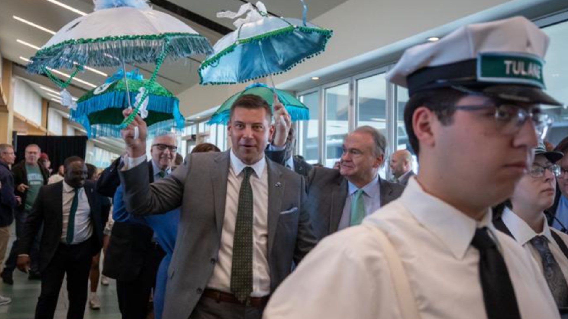 Coach Sumrall joins new Tulane AD to ride in Krewe of Freret Parade