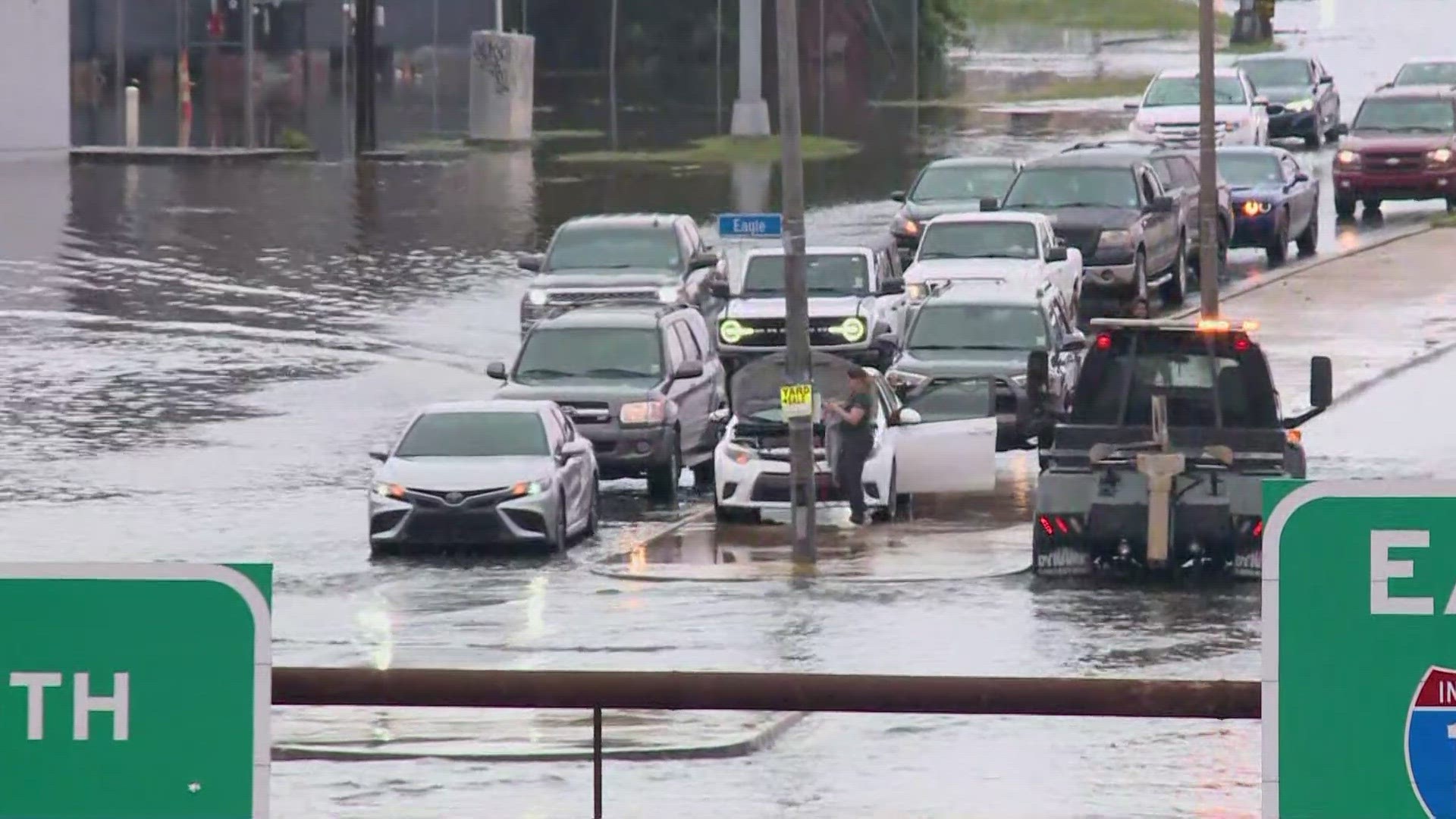 City wide flooding has some cars stalled on the I-10 near Airline.