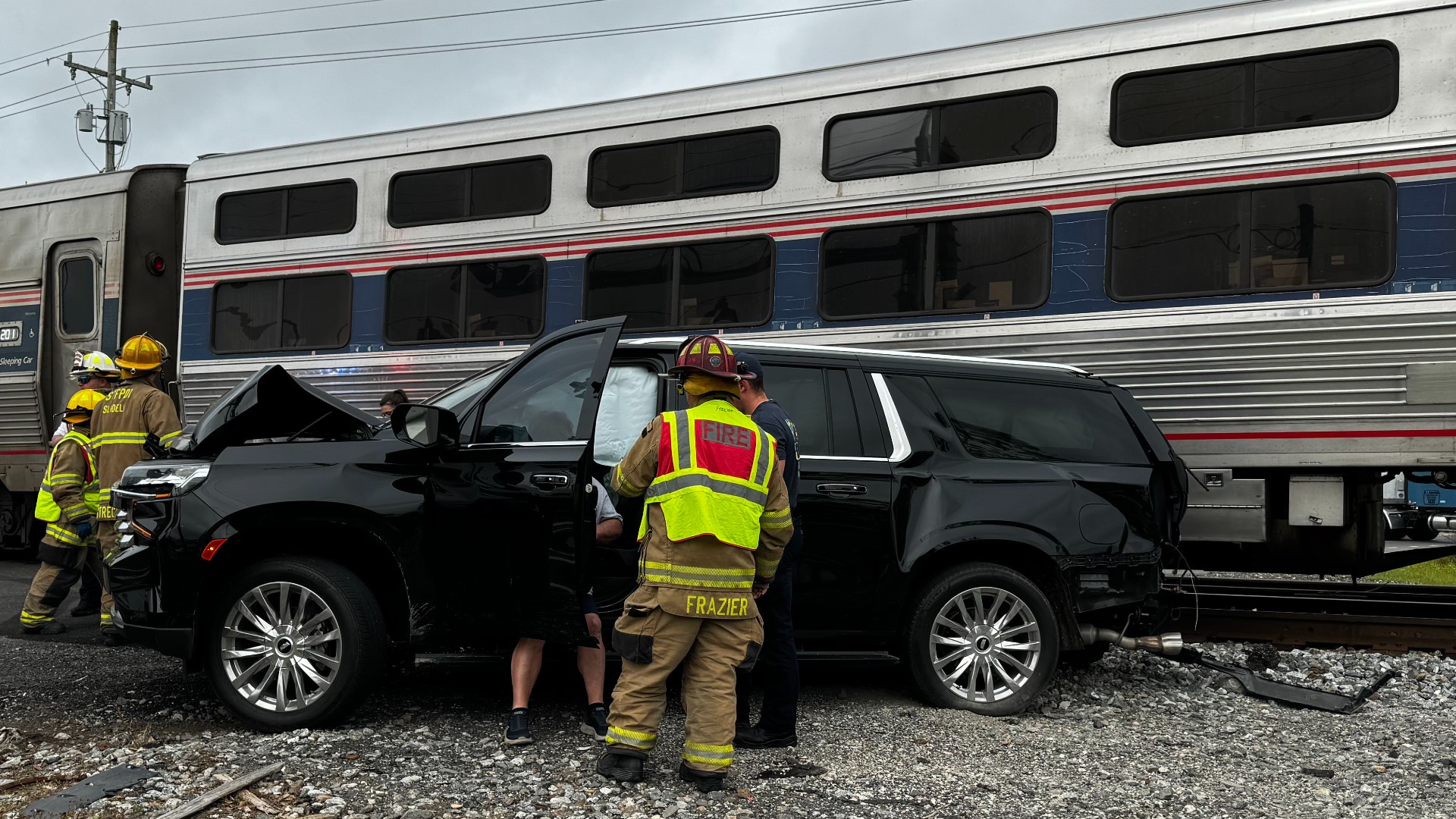 The Slidell Police Deparment captures the aftermath of a collision between an Amtrak passenger train and an SUV at a railroad crossing near Gause Blvd and Front St.