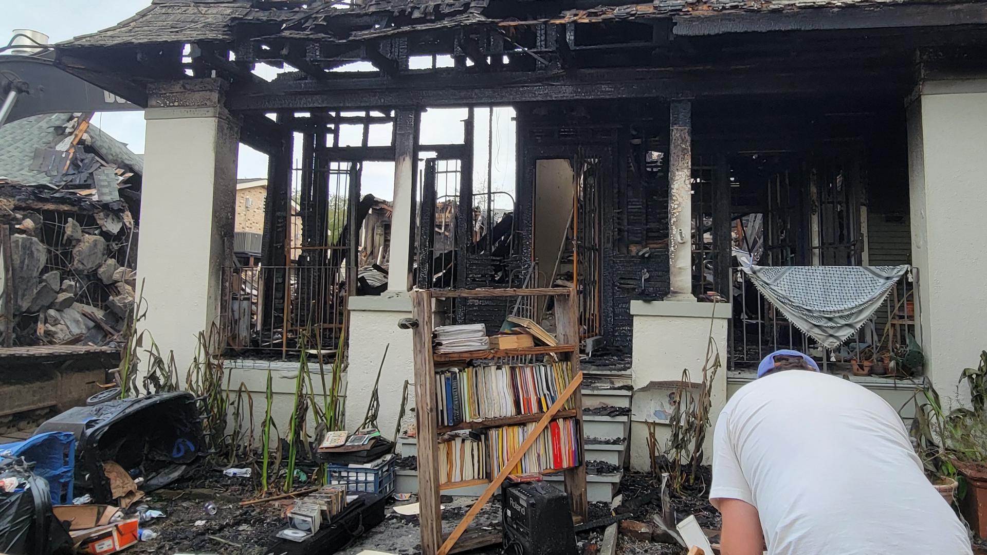 Mid-City couple walks through home after fire