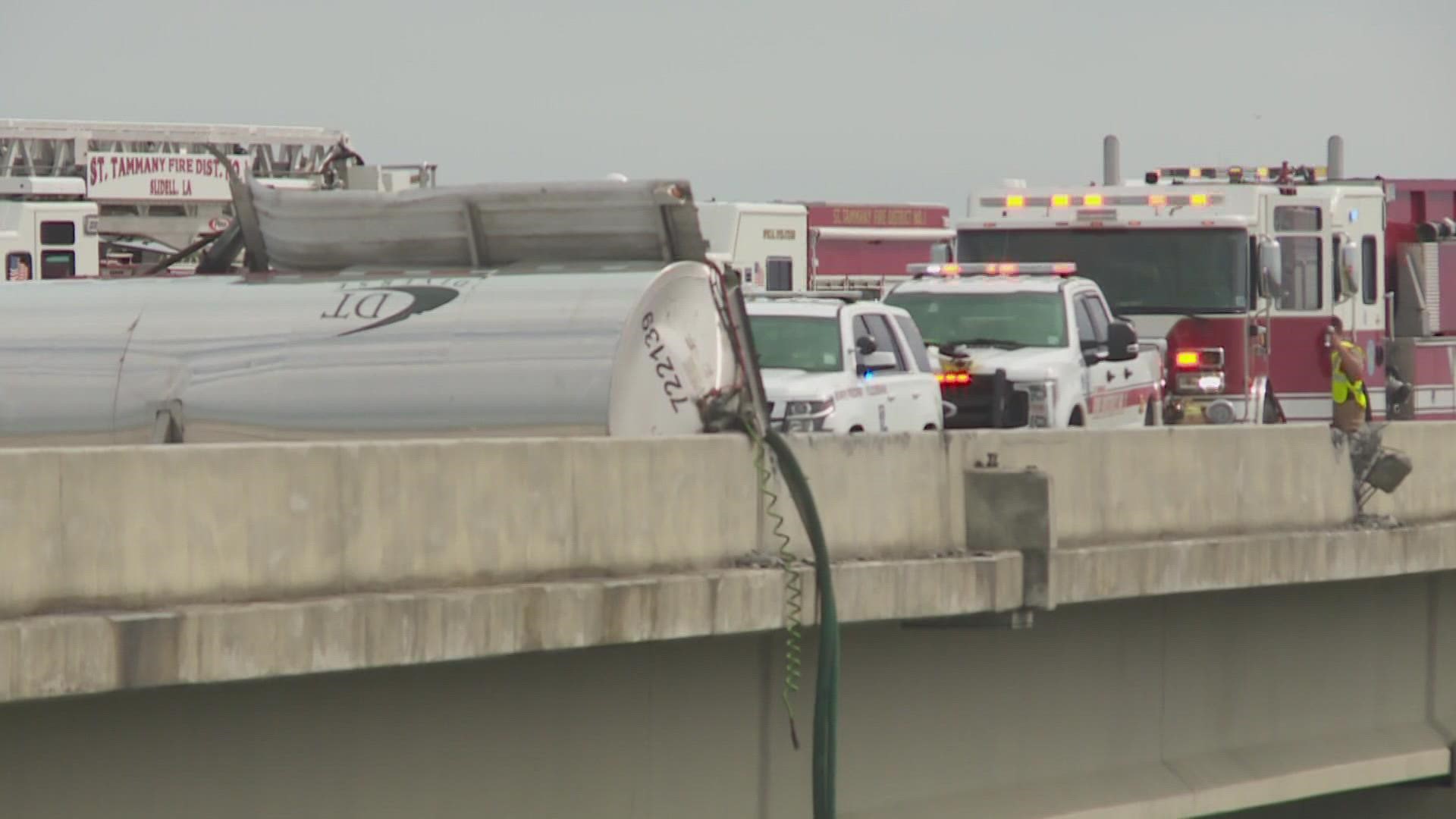 Westbound I-10 was closed for nearly 10 hours after an 18-wheeler turned over and its cab went in to Lake Pontchartrain Sunday.