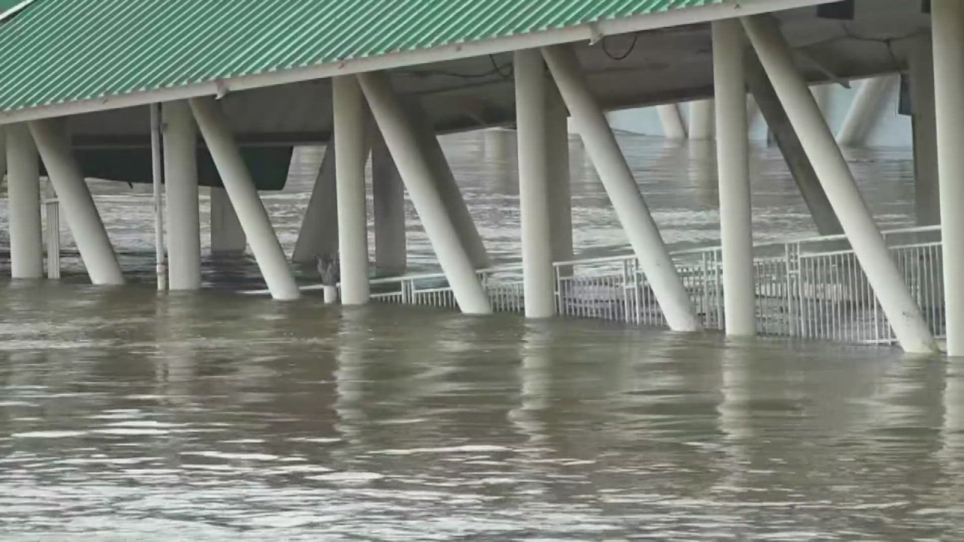 Officials said a failed floating buoy between two old pedestrian bridges near the river caused the collapse.
