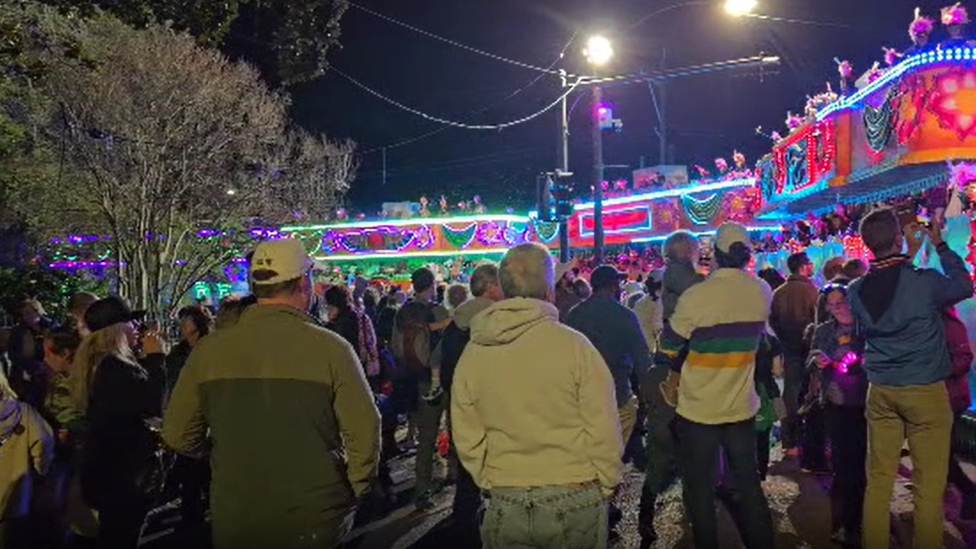 Parade stops after float gets caught in tree