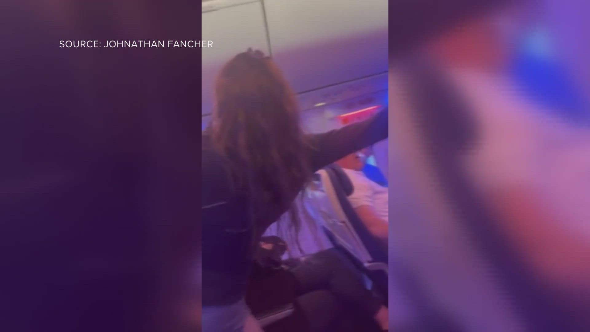 Woman seen on video resisting attempt to get her off of Southwest Airlines flight.